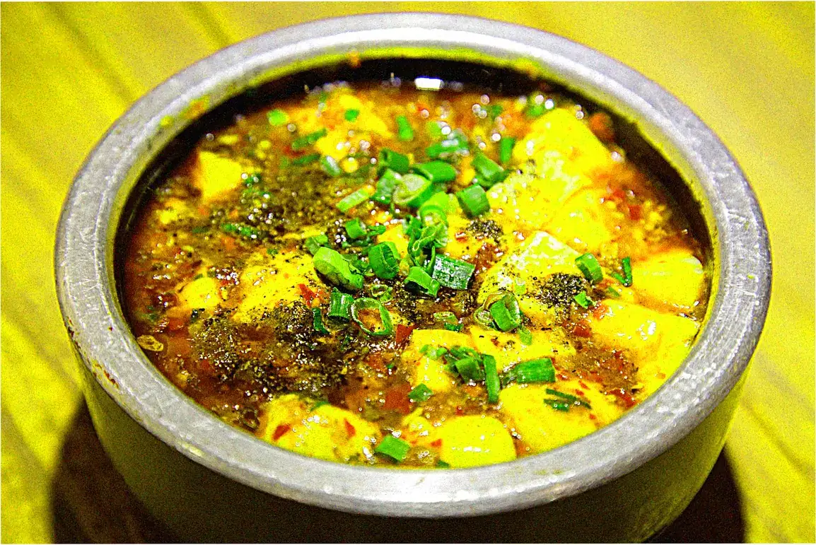 How does authentic Sichuan hot pot differ globally?
